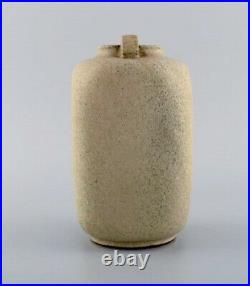 Arne Bang. Ceramic vase with square corpus with two small angled handles