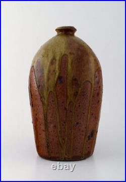 Dorthe Møller, own workshop, ceramic vase in rustic style. Raku burned