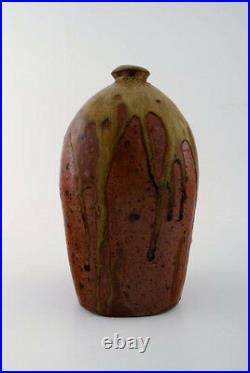 Dorthe Møller, own workshop, ceramic vase in rustic style. Raku burned
