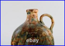 Gustaf Johnn for Höganäs. Antique Art Nouveau jug in glazed ceramic. Late 19th c