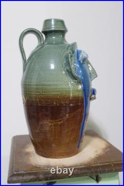 Randy tobias face jug, pottery, folkart 11''x7'