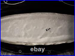 Signed pottery plater 20.5 Inch Iong