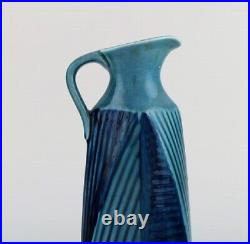 Vilhelm Bjerke Petersen (1909-1957) for Rörstrand. Fasett jug in glazed ceramics
