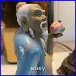Vintage Shiwan Ceramic Art Pottery Chinese Mud Man Figurine holding Fruit