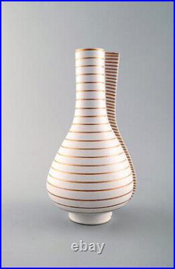 Wilhelm Kåge for Gustavsberg Studio Hand. Large Gold Surrea ceramic split vase