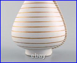 Wilhelm Kåge for Gustavsberg Studio Hand. Large Gold Surrea ceramic split vase